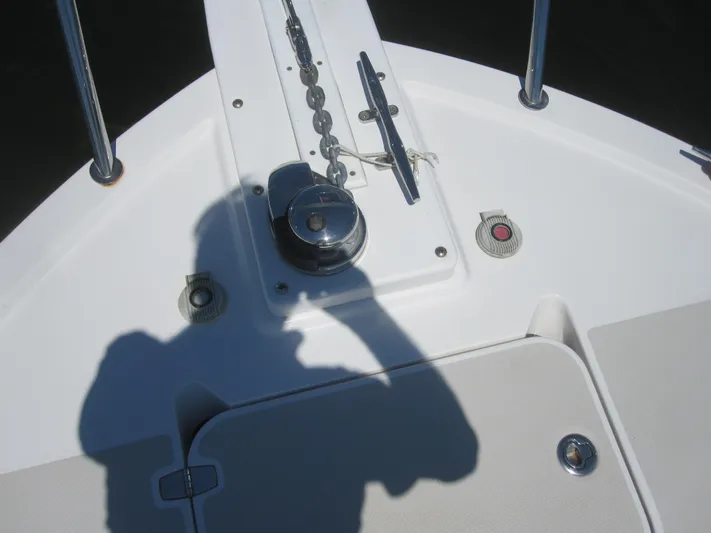  Yacht Photos Pics Bow of 2014 Back Cove 34 Hard Top boat with anchor chain and shadow.