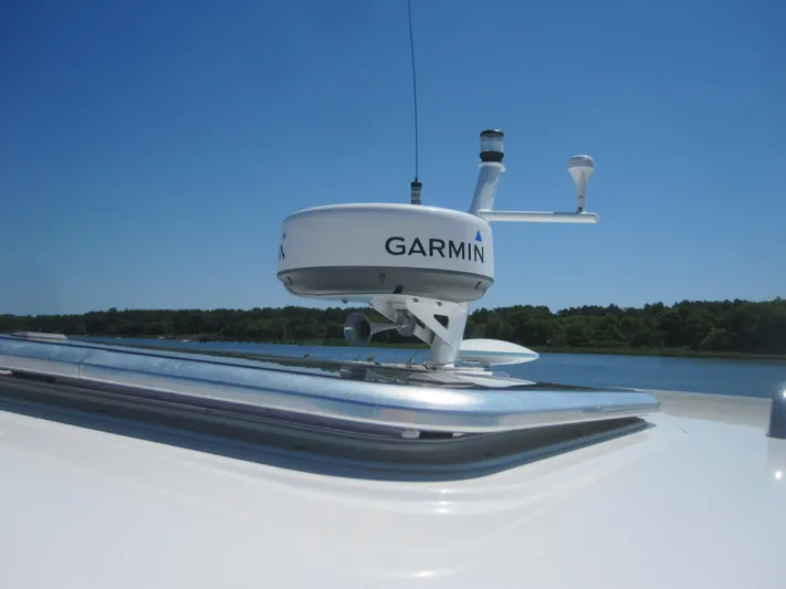  Yacht Photos Pics Garmin radar on 2014 Back Cove 34 Hard Top boat under clear blue sky.