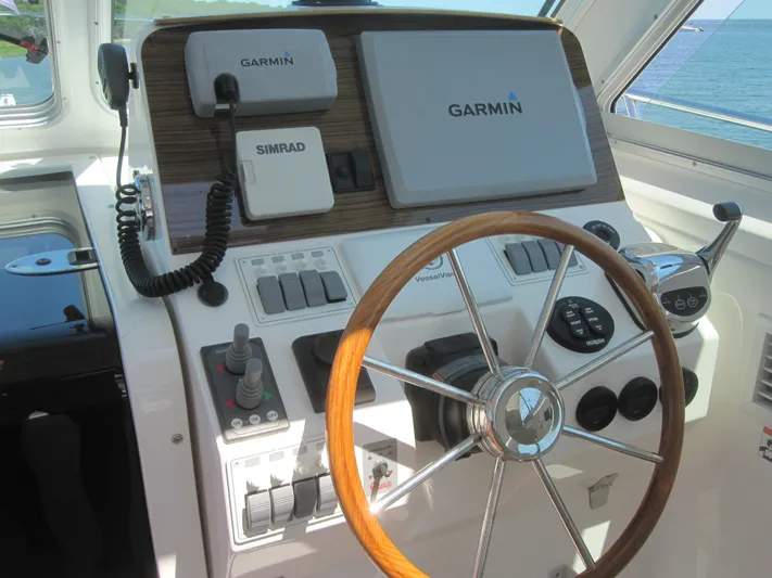  Yacht Photos Pics 2014 Back Cove 34 helm with Garmin and Simrad navigation systems.