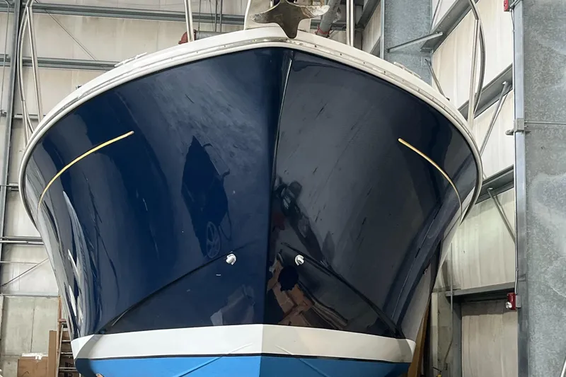  Yacht Photos Pics 2014 Back Cove 34 Hard Top/Hard Back boat in storage, front view.