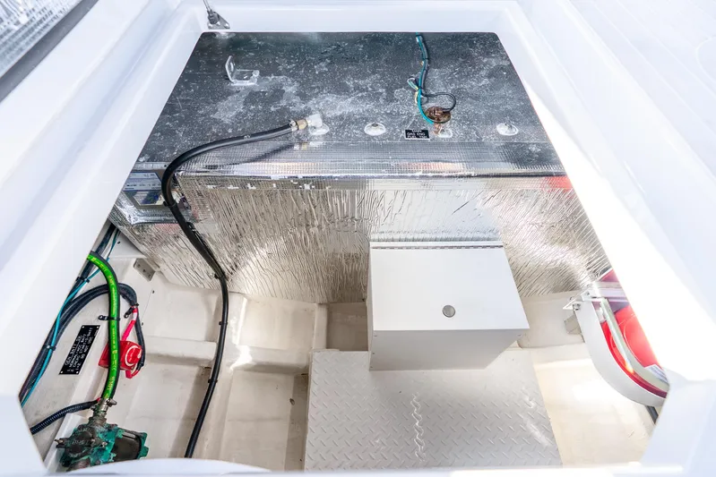 South Beach Edition -- Like New Trade In Yacht Photos Pics 2024 Cruisers Yachts 34 GLS OB engine compartment with wiring and components.