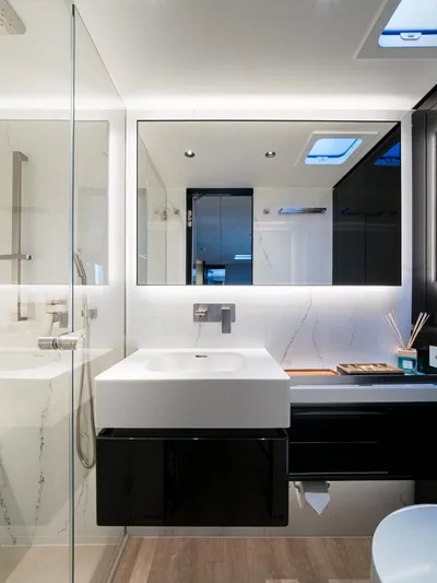 N+1 Yacht Photos Pics Luxurious bathroom interior of 2024 Sunreef 70 Eco yacht, featuring modern fixtures and elegant design.