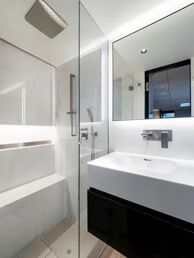 N+1 Yacht Photos Pics Luxurious bathroom in 2024 Sunreef 70 Eco yacht, featuring modern fixtures and elegant design.