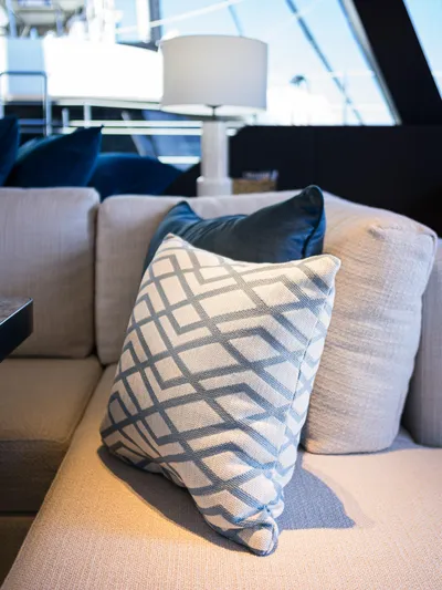 N+1 Yacht Photos Pics Luxurious interior of 2024 Sunreef 70 Eco yacht with patterned cushion and elegant decor.