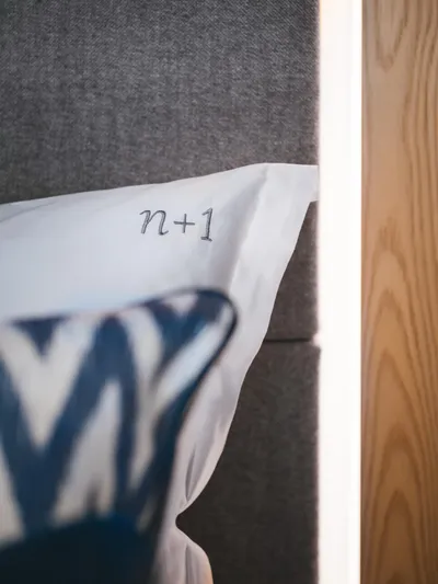 N+1 Yacht Photos Pics Pillow with "n+1" embroidery on Sunreef 70 Eco yacht, 2024 model.