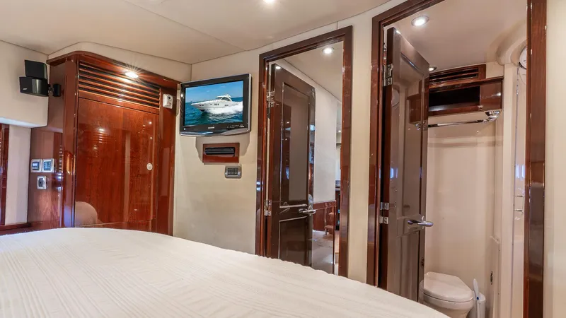 Three Sons Yacht Photos Pics Luxurious 2008 Sea Ray Sundancer yacht interior with wood finishes and modern amenities.