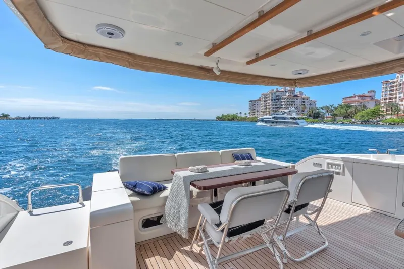  Yacht Photos Pics Luxury yacht Fairline Squadron 66, 2013 model, with elegant deck and ocean view.