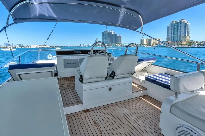  Yacht Photos Pics Luxurious 2013 Fairline Squadron 66 yacht interior with city skyline view.