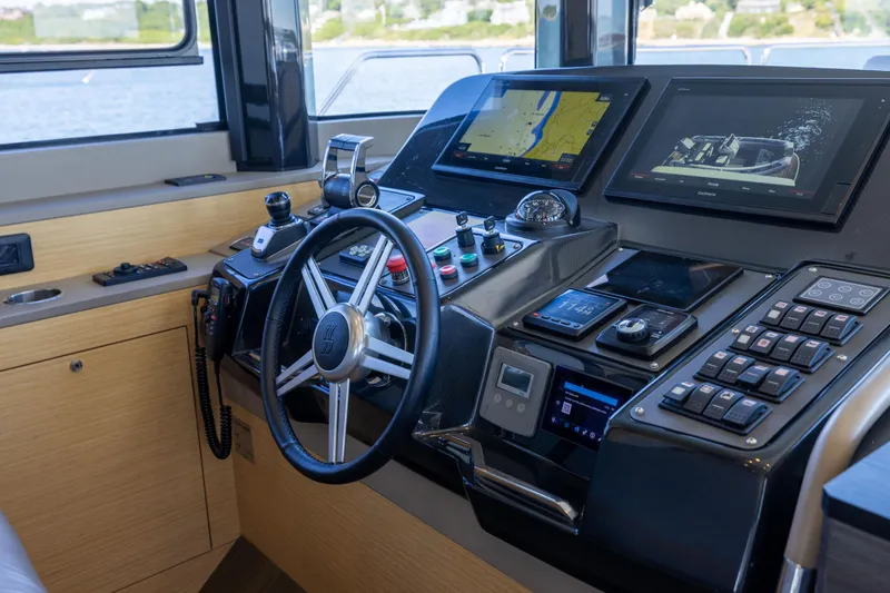 Amor Fati Yacht Photos Pics Cockpit of 2019 Sirena 64 yacht with advanced navigation and control systems.