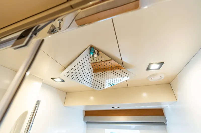 Amor Fati Yacht Photos Pics Ceiling view of 2019 Sirena 64 yacht interior with modern lighting and ventilation.