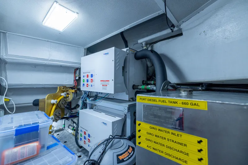 Amor Fati Yacht Photos Pics Engine room of 2019 Sirena 64 yacht with fuel tank and control systems.