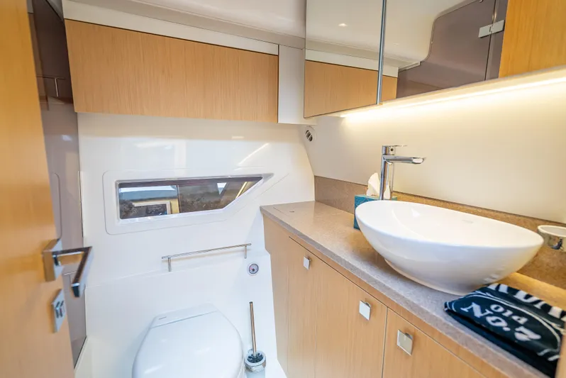  Yacht Photos Pics Modern bathroom in 2021 Skamander Monaco yacht with sleek fixtures and wooden cabinetry.