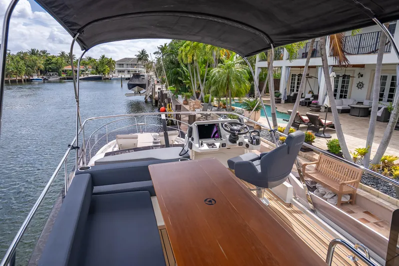  Yacht Photos Pics Luxurious 2021 Skamander Monaco yacht docked by a waterfront villa.