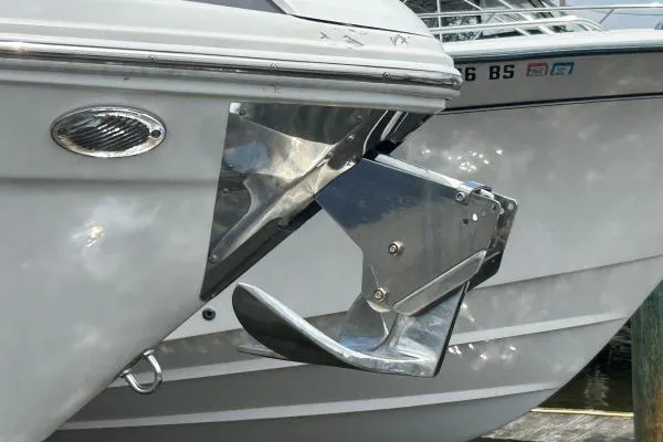 Qtech-1 Yacht Photos Pics 2015 Regal 32 Express boat anchor detail with polished metal finish.
