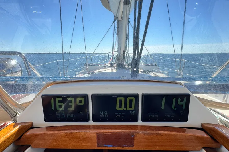 Munequita Yacht Photos Pics Sailing on a 2013 Tartan 4000 yacht with digital navigation displays.