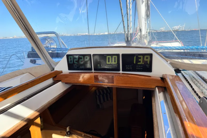 Munequita Yacht Photos Pics Cockpit view of 2013 Tartan 4000 sailboat with digital navigation displays.