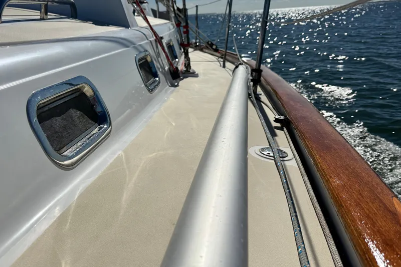 Munequita Yacht Photos Pics Deck view of 2013 Tartan 4000 sailboat on sunny ocean day.