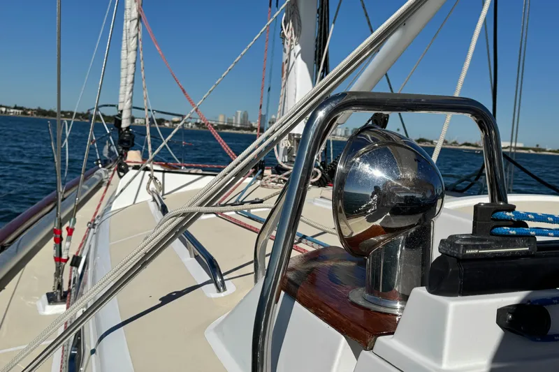 Munequita Yacht Photos Pics Sailing on a 2013 Tartan 4000 yacht, showcasing deck and rigging details.