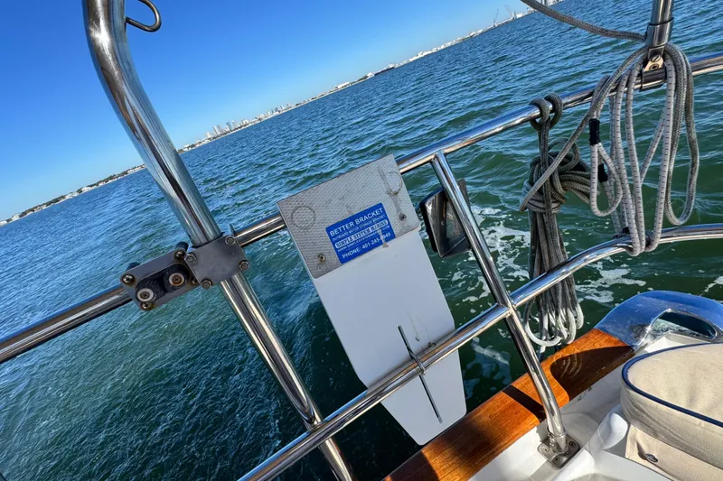 Munequita Yacht Photos Pics Sailboat deck view with ropes and railing, Tartan 4000, 2013 model, on open water.