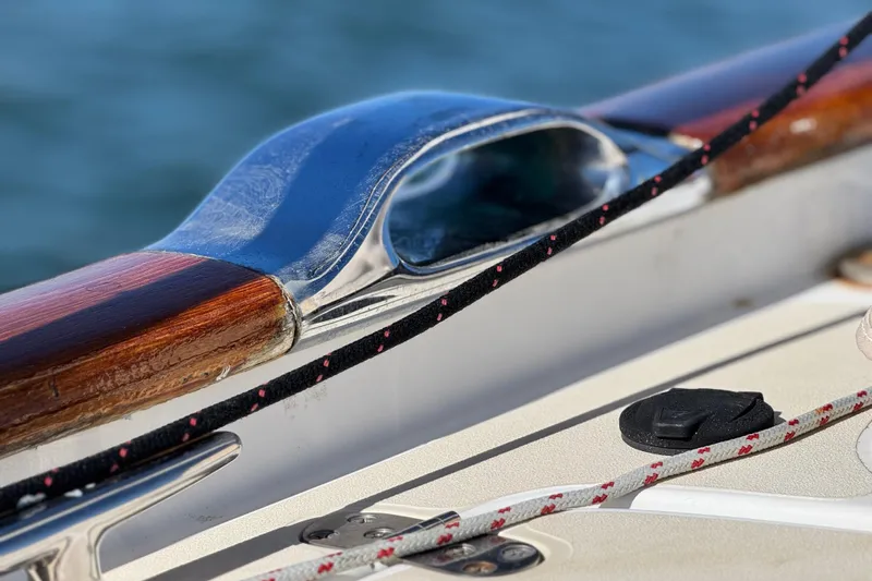 Munequita Yacht Photos Pics Close-up of Tartan 4000 sailboat deck details, featuring polished wood and rope, 2013 model.