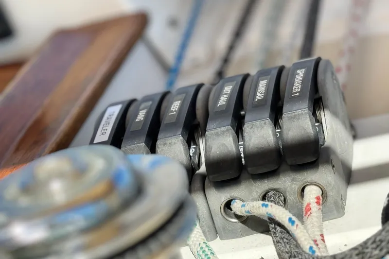 Munequita Yacht Photos Pics Close-up of Tartan 4000 sailboat control levers, 2013 model, labeled for various functions.