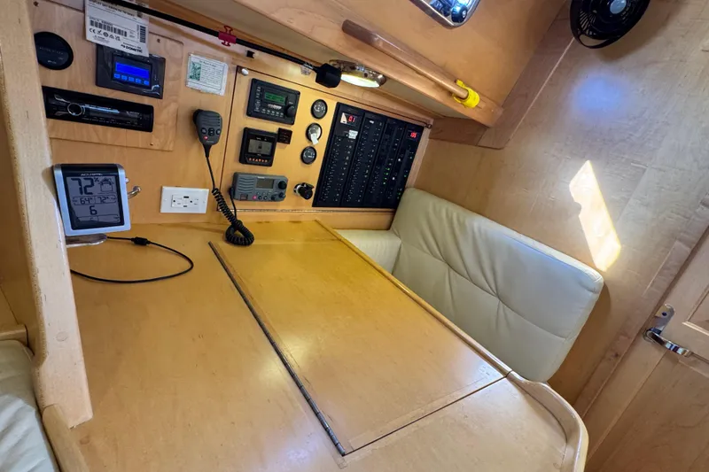 Munequita Yacht Photos Pics Control panel area in a 2013 Tartan 4000 yacht with navigation equipment.