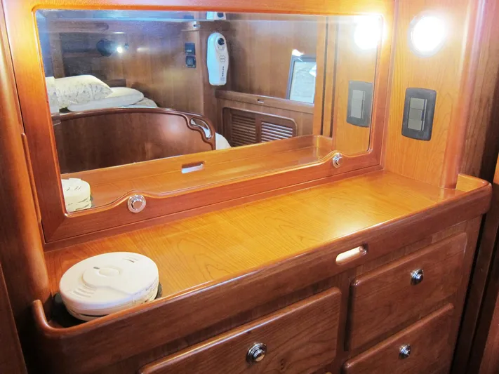 Solitude Yacht Photos Pics Wooden vanity with mirror and drawers in Passport 545 yacht, 2018 model.