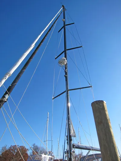 Solitude Yacht Photos Pics Sailboat mast against clear blue sky, Passport 545, 2018 model.