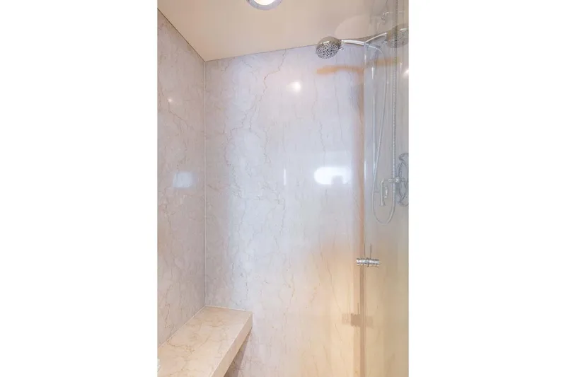 Chanson Yacht Photos Pics Luxurious marble shower interior on 1995 Christensen Tri-Deck yacht.
