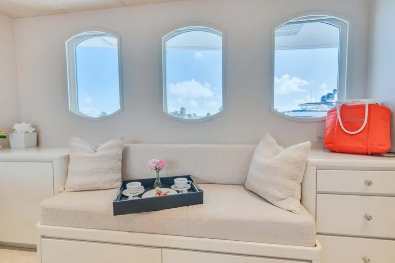 Chanson Yacht Photos Pics Luxurious 1995 Christensen Tri-Deck yacht interior with cozy seating and elegant decor.