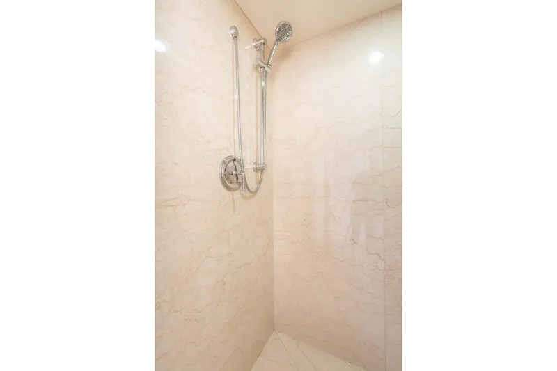 Chanson Yacht Photos Pics Luxurious marble shower in 1995 Christensen Tri-Deck yacht bathroom.