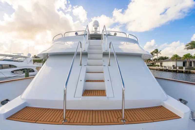 Chanson Yacht Photos Pics Luxurious 1995 Christensen Tri-Deck yacht with elegant wooden deck and sleek design.