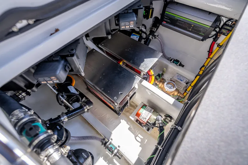  Yacht Photos Pics Engine compartment of 2025 Nor-Tech 340 Sport boat, showcasing advanced mechanical components.