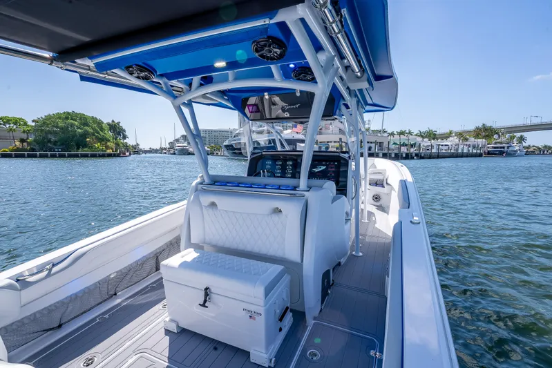  Yacht Photos Pics 2025 Nor-Tech 340 Sport boat interior with modern design, docked on a sunny day.