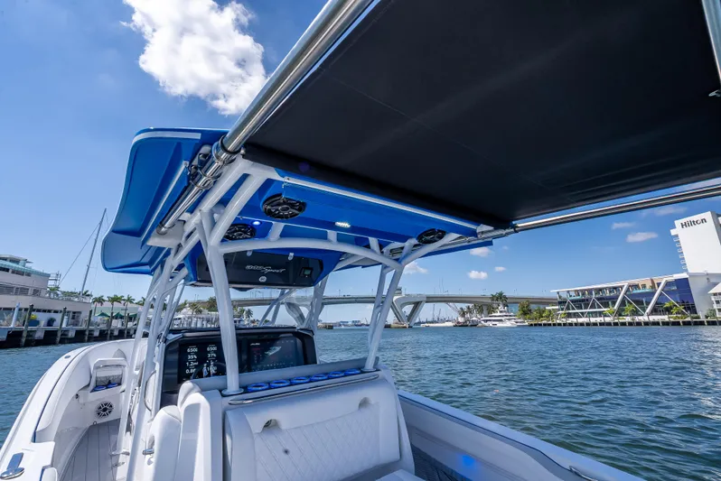  Yacht Photos Pics 2025 Nor-Tech 340 Sport boat on water, featuring sleek design and modern amenities.