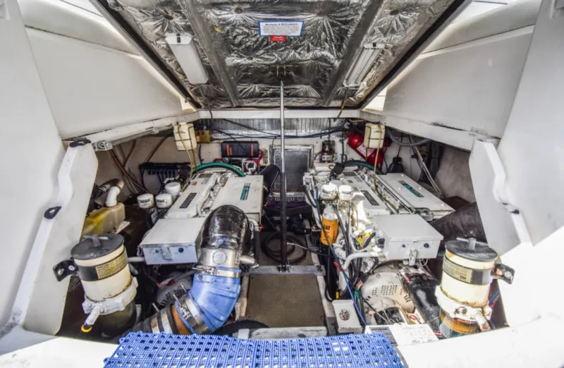 Rocky N Friends Yacht Photos Pics Engine room of 2003 Luhrs 36 Open boat, showcasing dual engines and equipment.