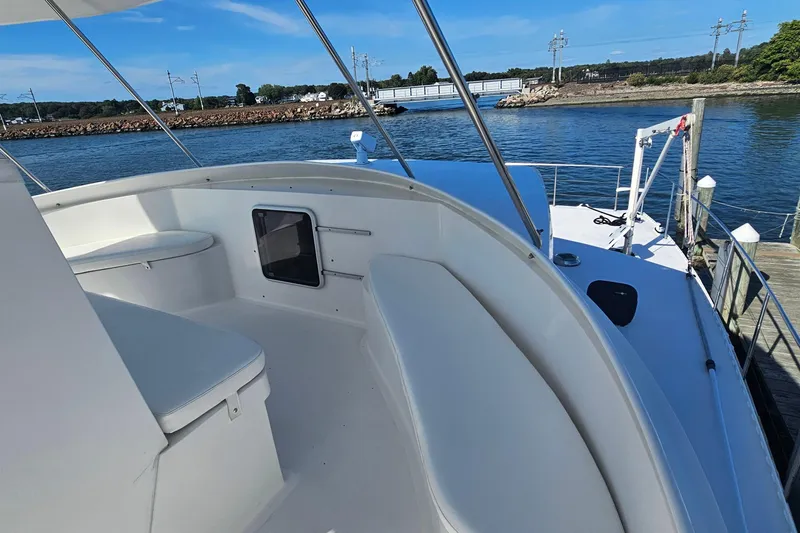 Nantucket Sleighride Yacht Photos Pics Custom 2005 Sea Raider Catamaran docked, featuring spacious deck and seating area.