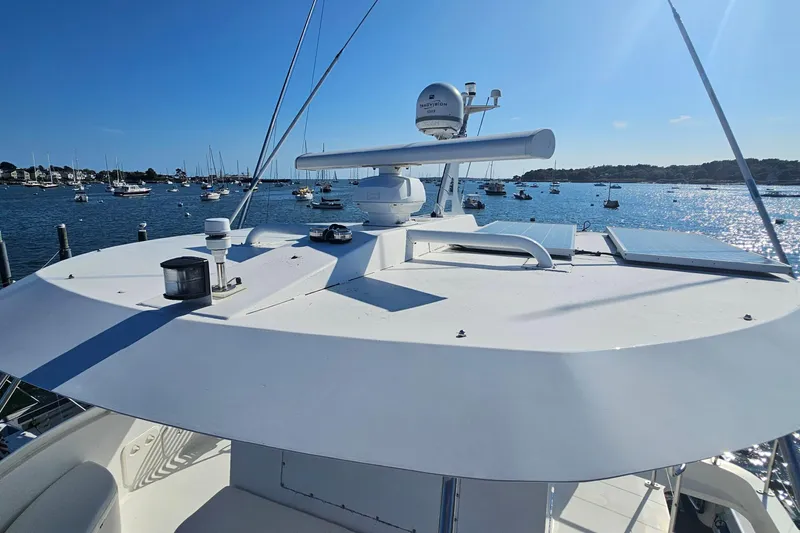 Nantucket Sleighride Yacht Photos Pics Custom 2005 Sea Raider Catamaran docked in a sunny marina with clear blue skies.