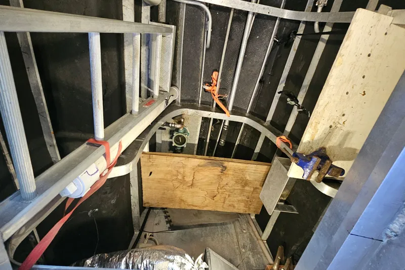 Nantucket Sleighride Yacht Photos Pics Interior view of a 2005 Custom Sea Raider Catamaran, featuring metal framework and equipment.