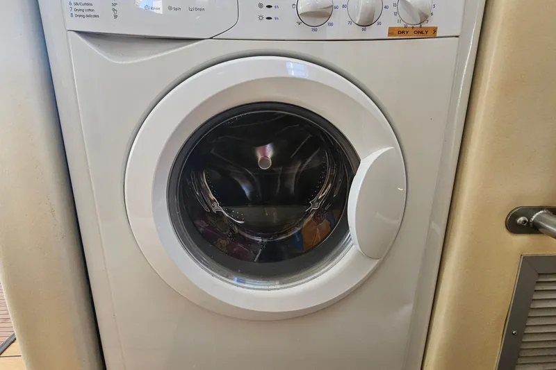 Nantucket Sleighride Yacht Photos Pics Washing machine inside 2005 Custom Sea Raider Catamaran, front-loading design.