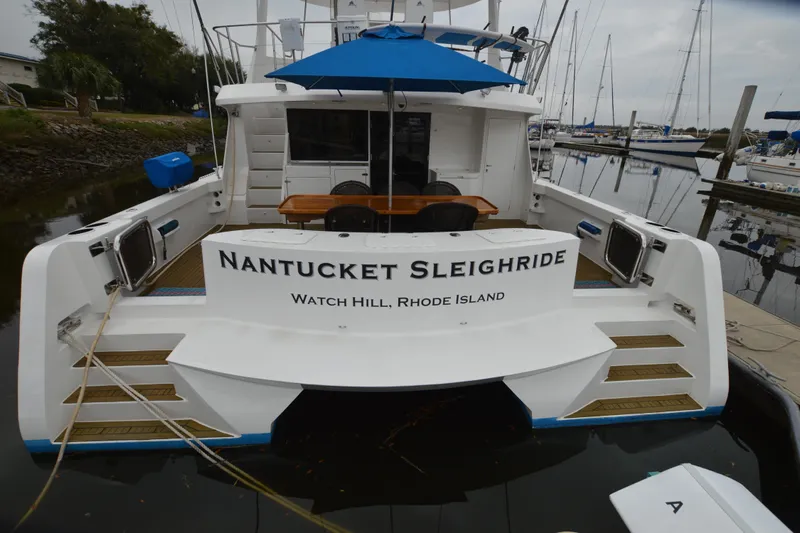 Nantucket Sleighride Yacht Photos Pics Custom 2005 Sea Raider Catamaran "Nantucket Sleighride" docked in Watch Hill, Rhode Island marina.