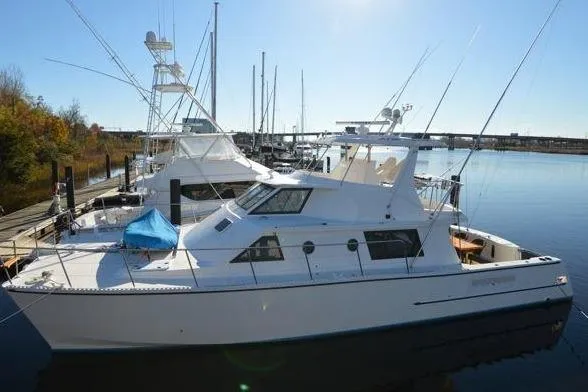 Nantucket Sleighride Yacht Photos Pics 2005 Custom Sea Raider Catamaran docked in a serene marina setting.