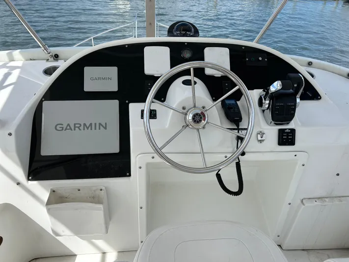 Tryst Yacht Photos Pics Helm of 2006 Beneteau 42 Swift Trawler with Garmin navigation system.