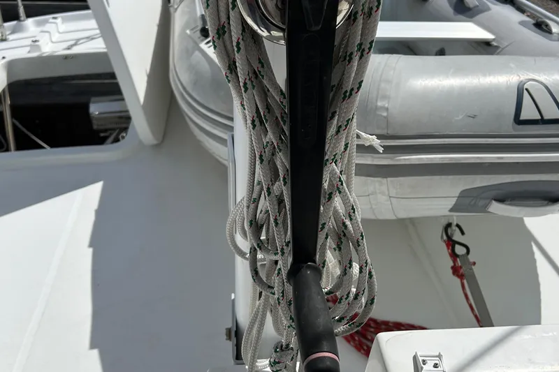 Tryst Yacht Photos Pics Beneteau 42 Swift Trawler 2006 deck with ropes and inflatable boat.