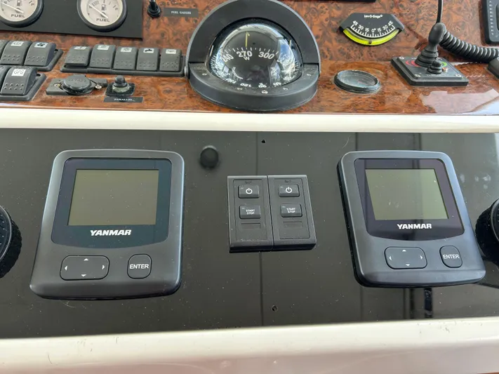 Tryst Yacht Photos Pics Control panel of 2006 Beneteau 42 Swift Trawler with Yanmar displays and navigation instruments.