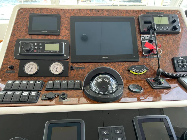 Tryst Yacht Photos Pics Control panel of a 2006 Beneteau 42 Swift Trawler with navigation instruments.