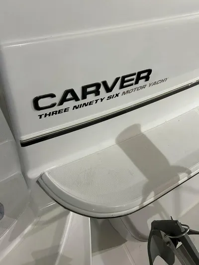Second Knot Yacht Photos Pics 2003 Carver 396 Aft Cabin Motor Yacht branding on white surface.