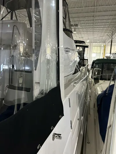 Second Knot Yacht Photos Pics 2003 Carver 396 Aft Cabin MY yacht in storage, side view.