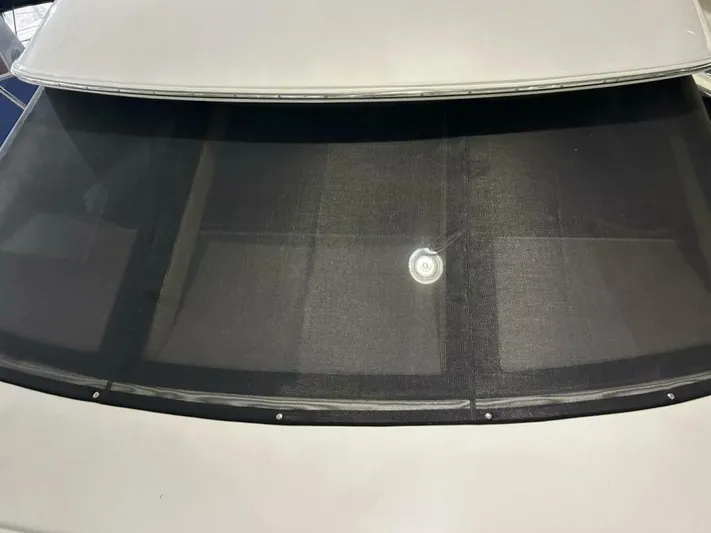 Second Knot Yacht Photos Pics 2003 Carver 396 Aft Cabin MY with black mesh windshield cover.