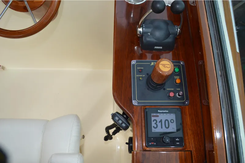Dragonfly Yacht Photos Pics Control panel of a 2009 Hinckley 37 boat with navigation instruments.